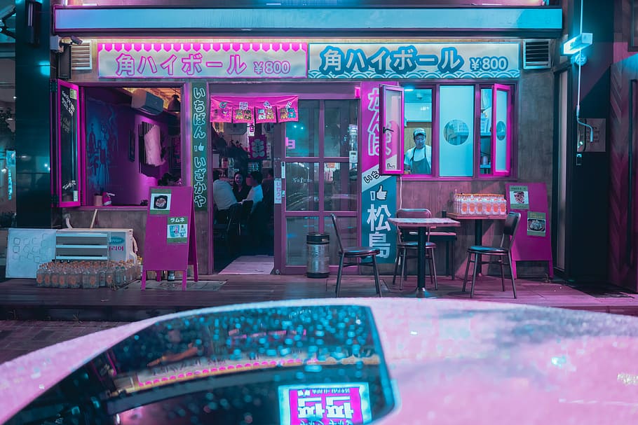 Last night’s rain, pink storefront, street photography, night photography