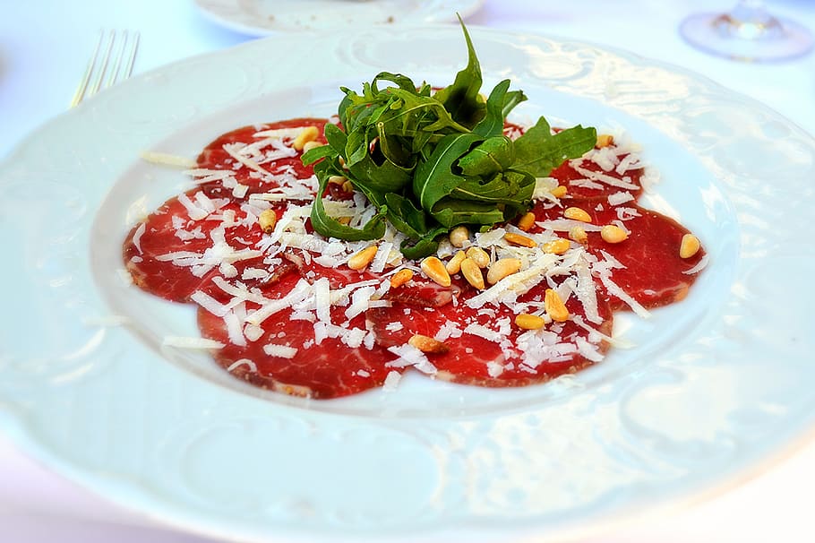 salad with red sauce on plate, Carpaccio, Rocket, Pine Nuts HD wallpaper