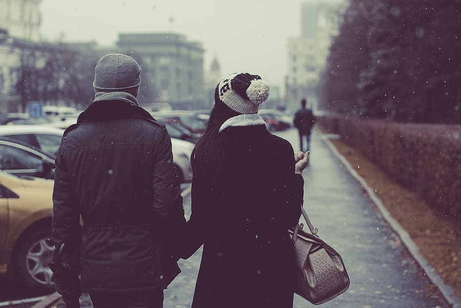 woman walking on sidewalk during daytime, couple, people, holding hands HD wallpaper