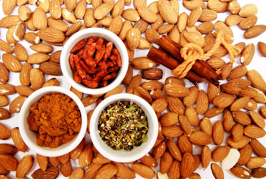 almond nuts photograph, almonds, cinnamon, spices, chili, curry HD wallpaper