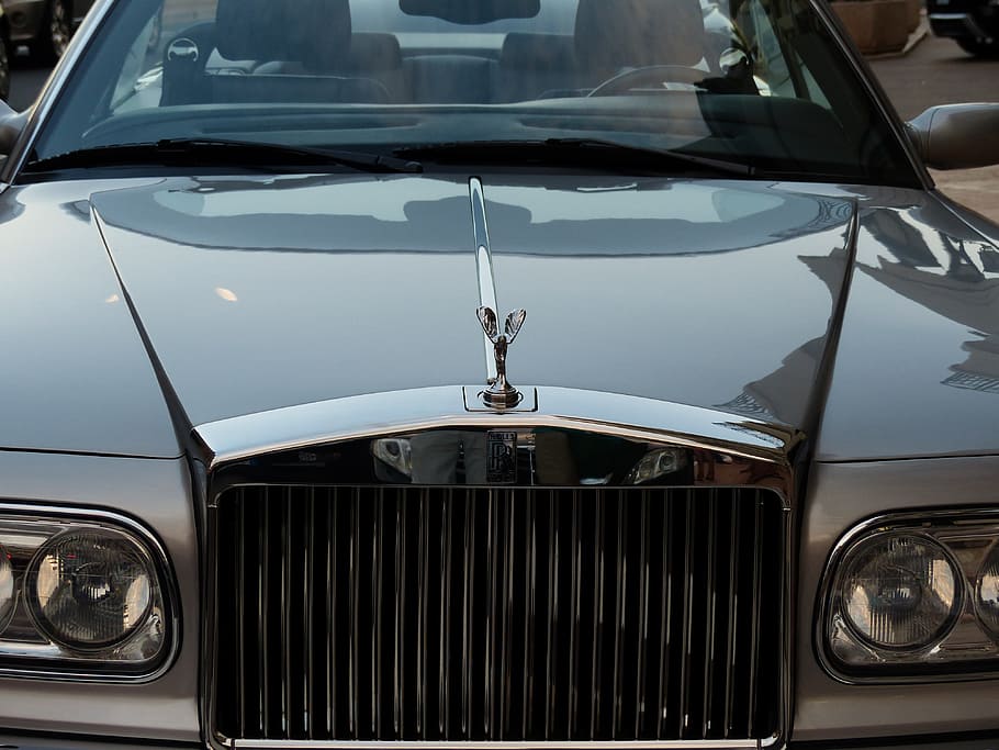 Silver Rolls Royce car, spirit of ecstasy, emily, figure, logo