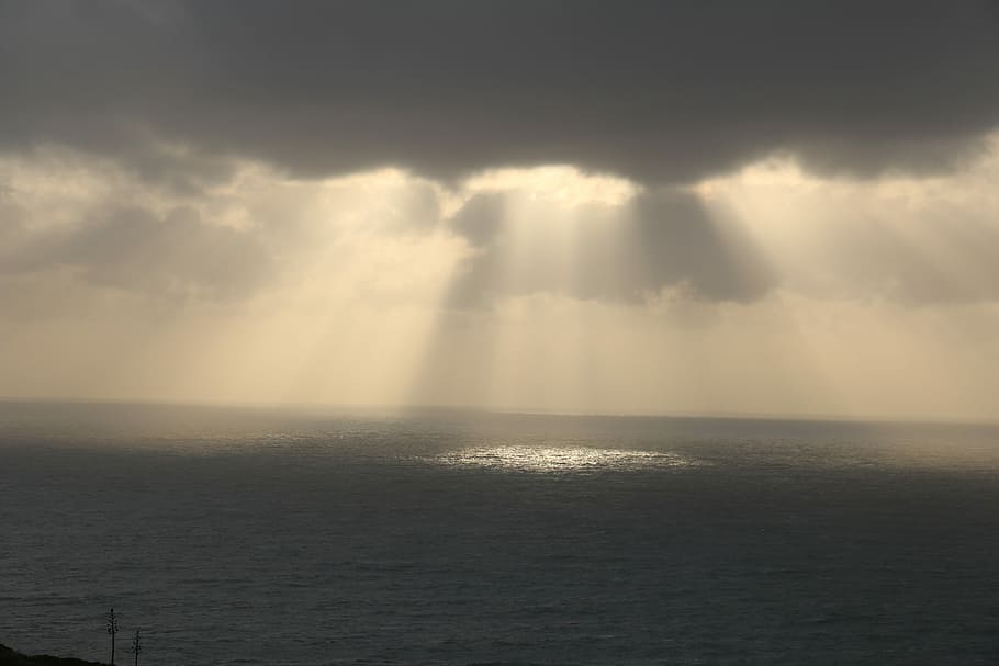 sunbeam-overcast-sea-ocean.jpg