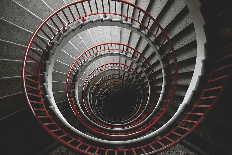 spiral concrete staircase, top view photograph of spiral stair HD wallpaper