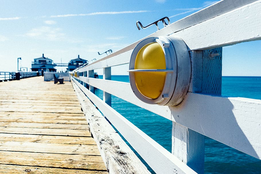 warning light placed on white wooden dockyard, yellow, signal HD wallpaper