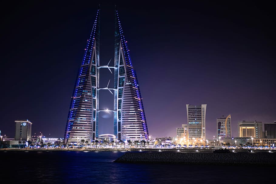 triangular-shape tower near body of water, cityscape photography HD wallpaper