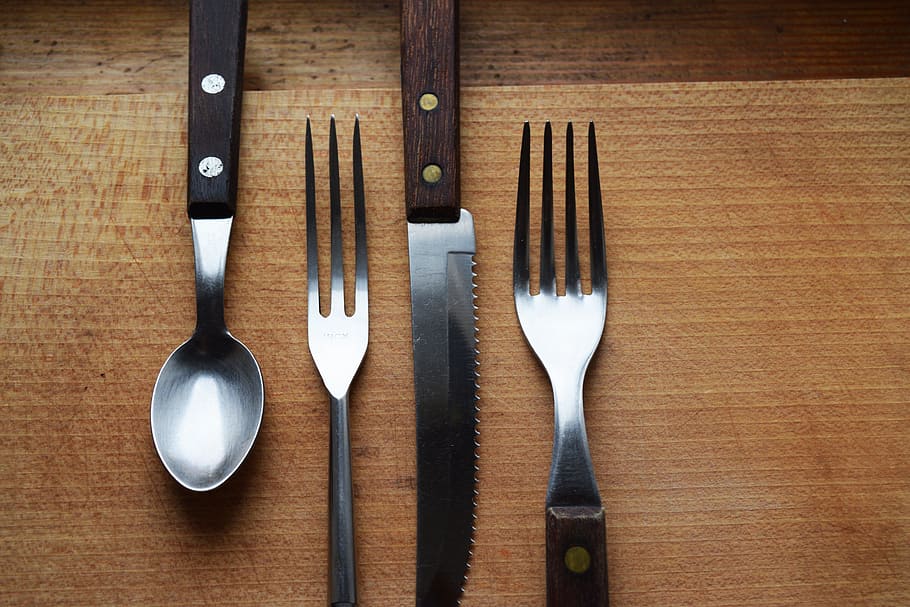 flat lay photography of utensil, spoon, fork, knife, kitchen