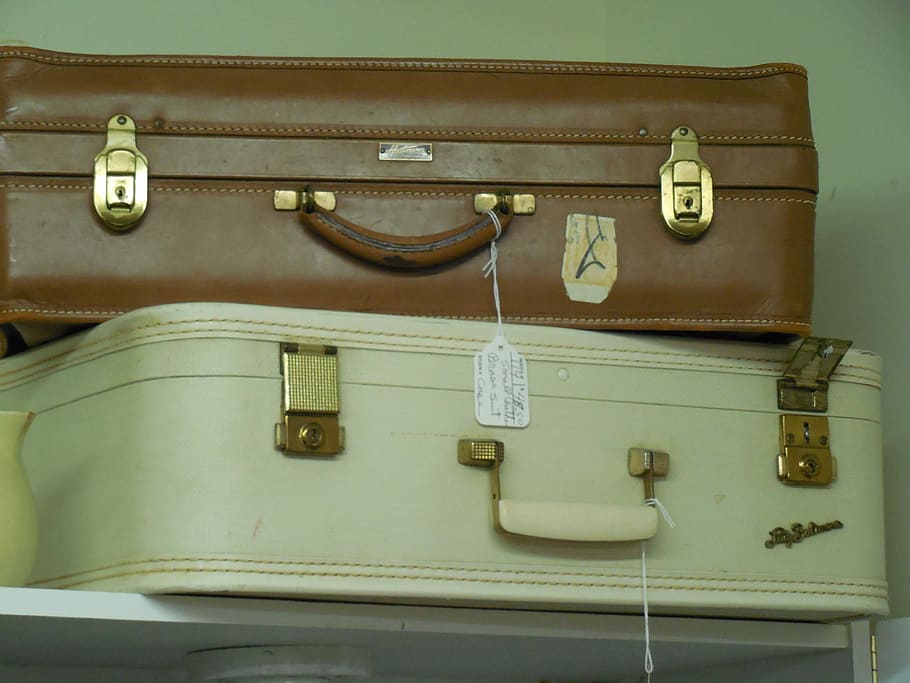 two white and brown leather luggage on white shelf, travel, suitcase