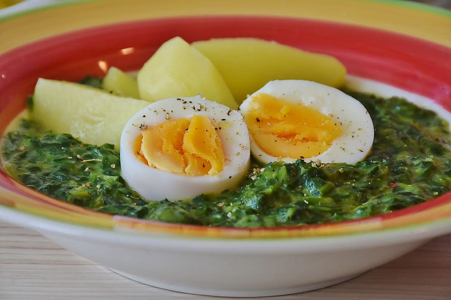 photo of soup dish with egg and papaya in red and yellow ceramic bowl HD wallpaper
