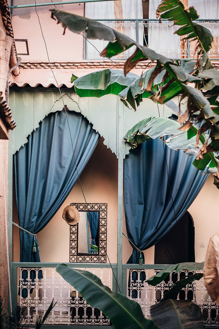 Riad Dar M’chicha, Marrakesh, photo of curtain swag in veranda near banana plant