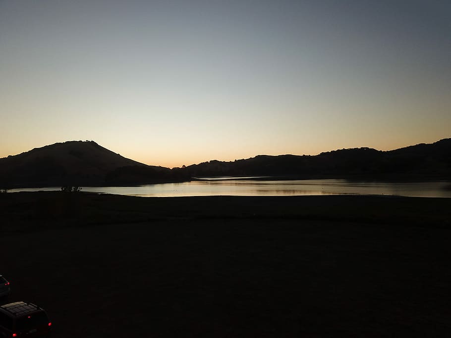 Sunrise before cycling, silhouette of hills during daytime, lake HD wallpaper