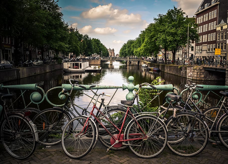 still, items, things, bicycles, parking, bridge, water, river HD wallpaper