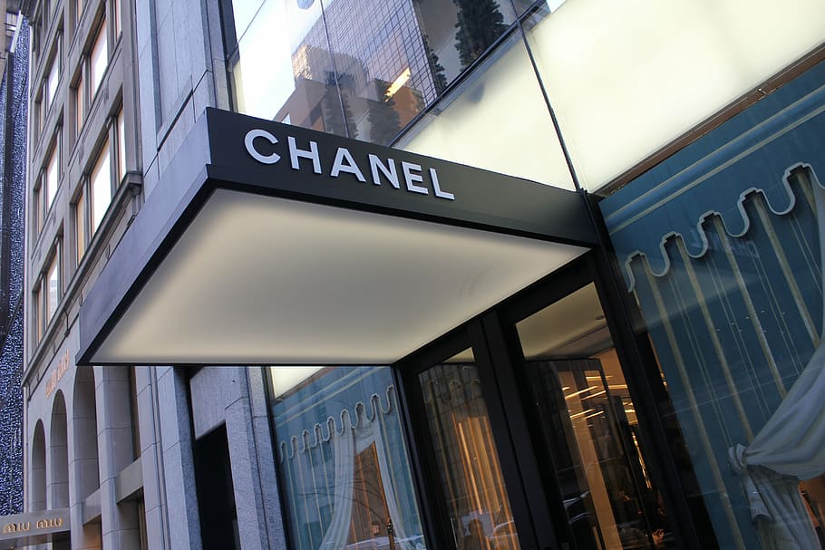 low-angle photography of grey and beige Chanel signage at daytime, HD wallpaper