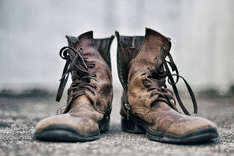 pair of brown leather boots in pavement, pair of brown leather work boots on sand HD wallpaper