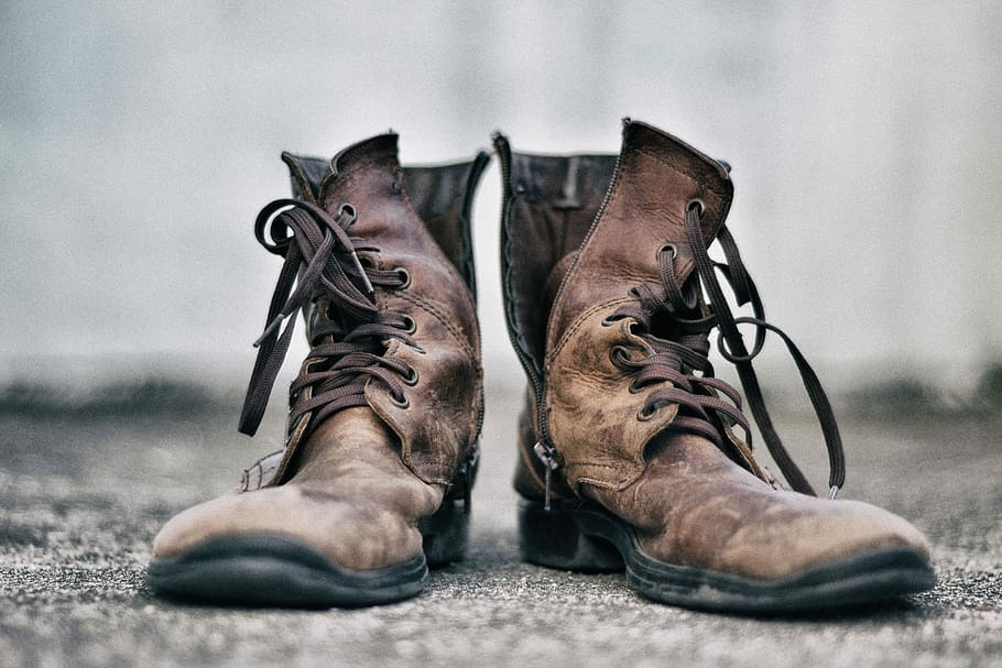 pair of brown leather boots in pavement, pair of brown leather work boots on sand HD wallpaper