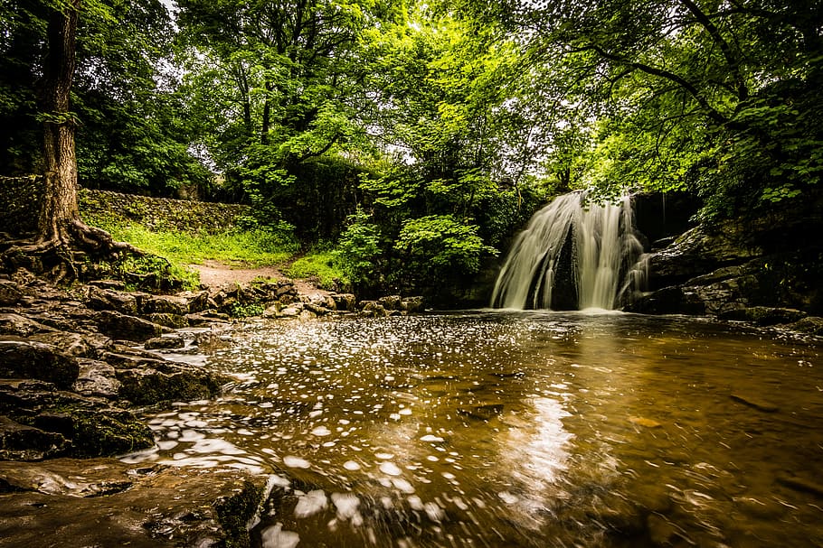 time lapse photography of waterfalls, janet's foss, malham, dales