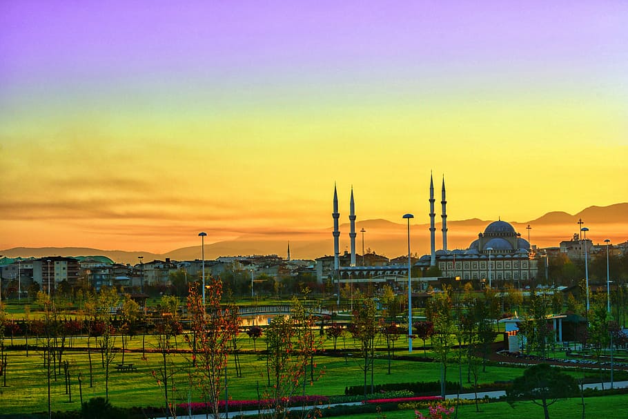 mosque near houses under purple and orange sky, panoramic, industry HD wallpaper