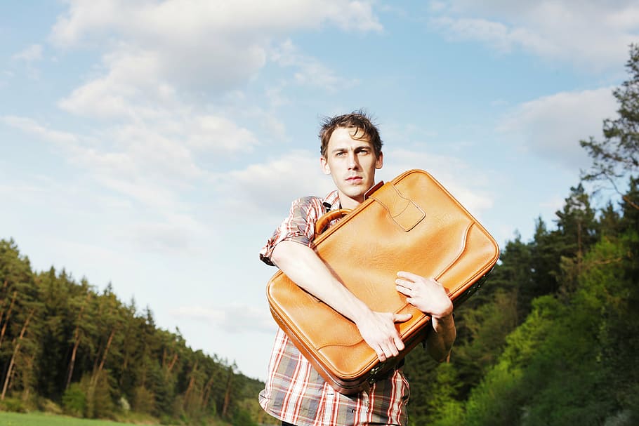 man holding leather bag, luggage, forward, young, uncertain, uncertainty, HD wallpaper