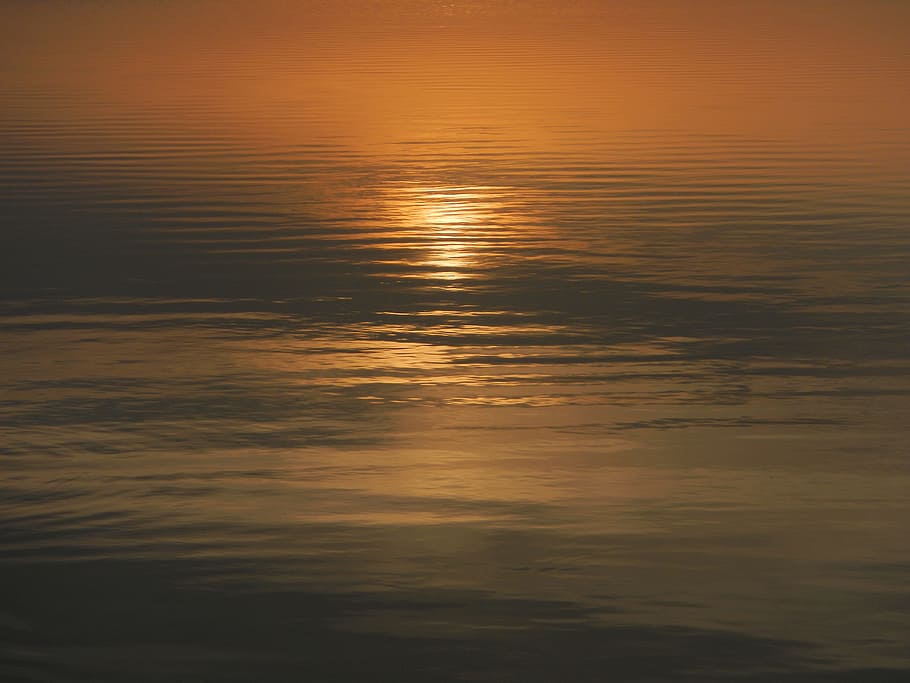 reflection of sun on body of water, calm body of water during daytime photography HD wallpaper