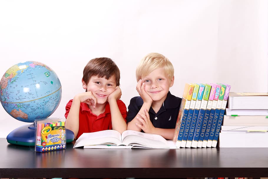 boys wearing red and black polo shirt, polo shirts, in between