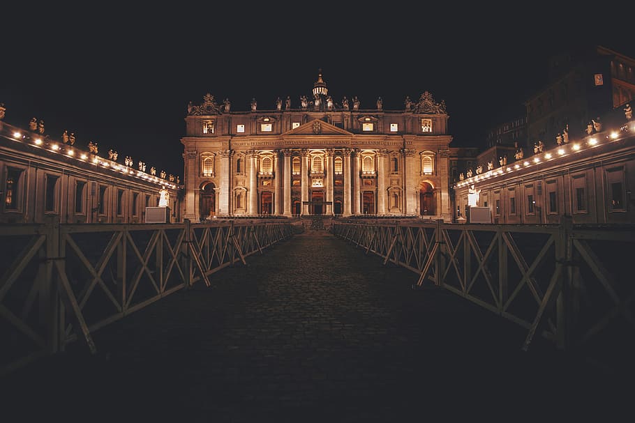 pathway leading to Saint Peter's Basilica at night time, landscape photo of gray building during nightime HD wallpaper