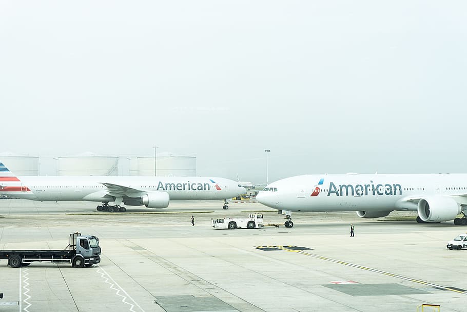 two American Airlines planes on airport, two American airliner on airport