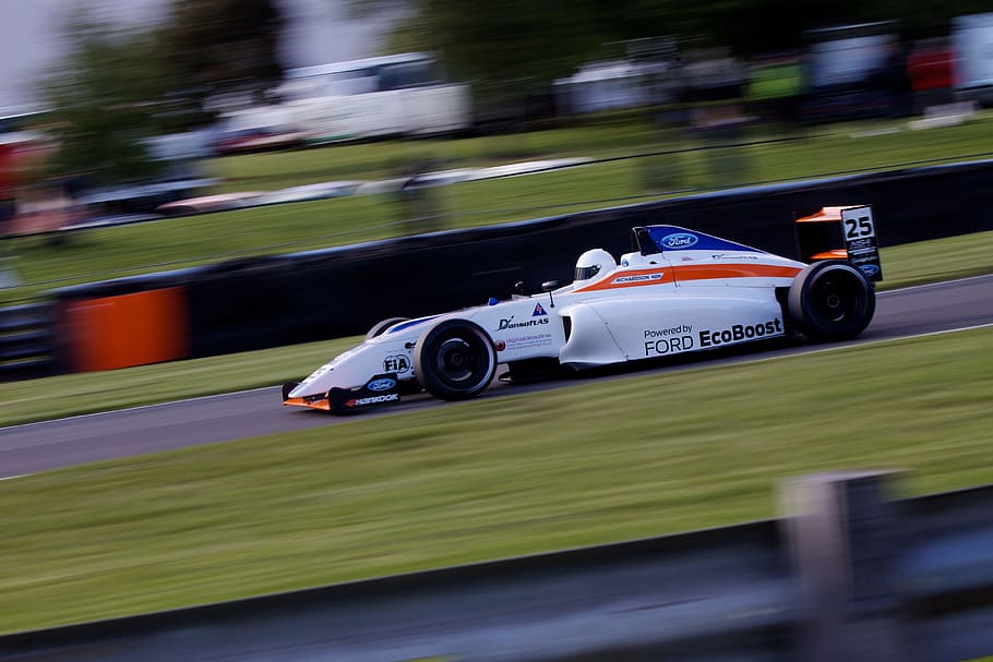white Ford EcoBoost F1 race car time lapse photography during daytime HD wallpaper