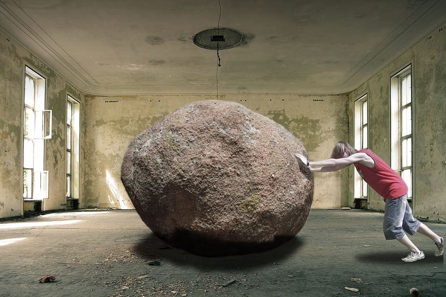 man in red tank top pushing brown stone, heavy, hard, work HD wallpaper