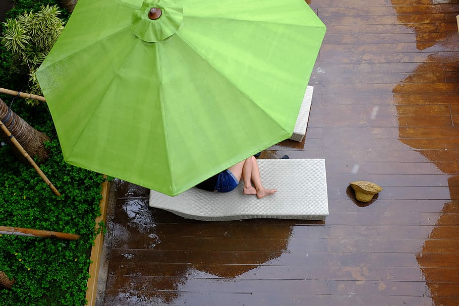 person lying on lounger under patio umbrella, woman underneath umbrella, HD wallpaper