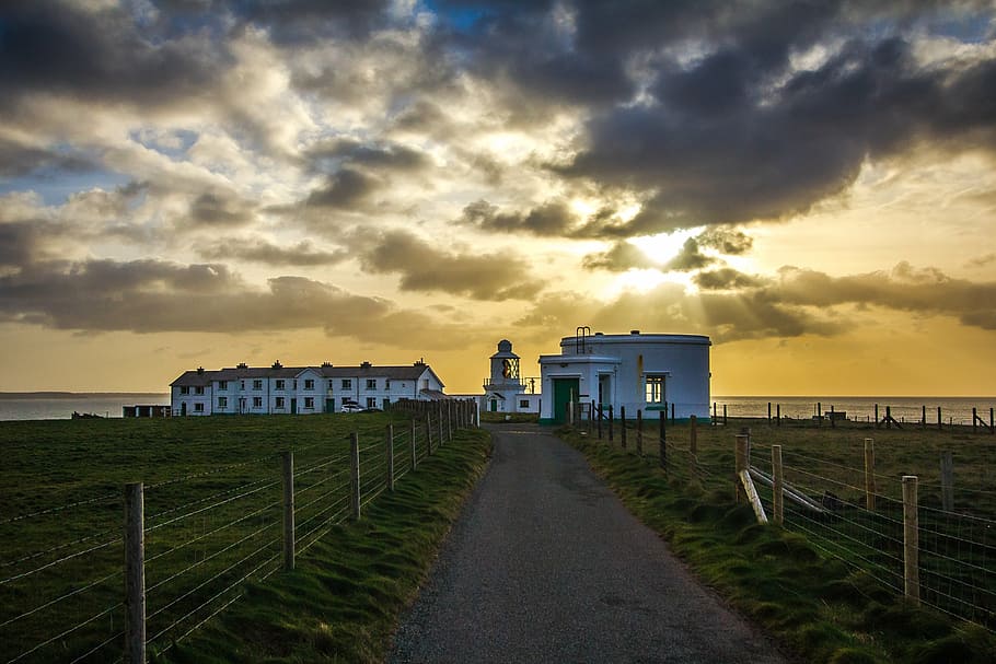 lighthouse, in the evening, clouds, ocean, wales, sunset, sky HD wallpaper