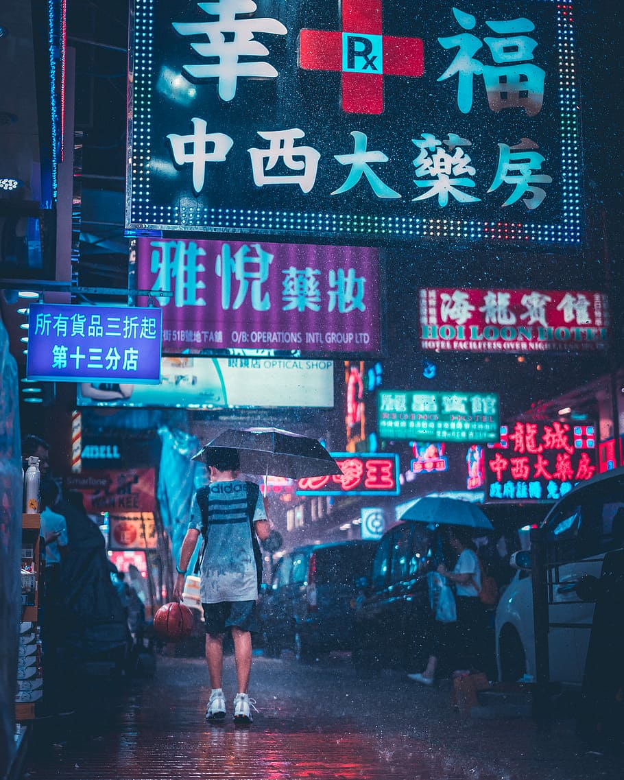 man in adidas shirt with umbrella walking in street under the rain, man holding umbrella during rainy nighttime lapse photo, HD wallpaper