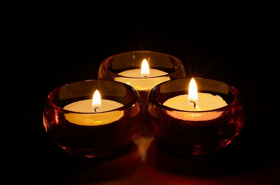 three lighted tealights, candles, dark, room, glass, fire, night