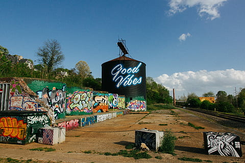 Good Vibes, multicolored graffiti-printed tanks, tower, silo HD wallpaper