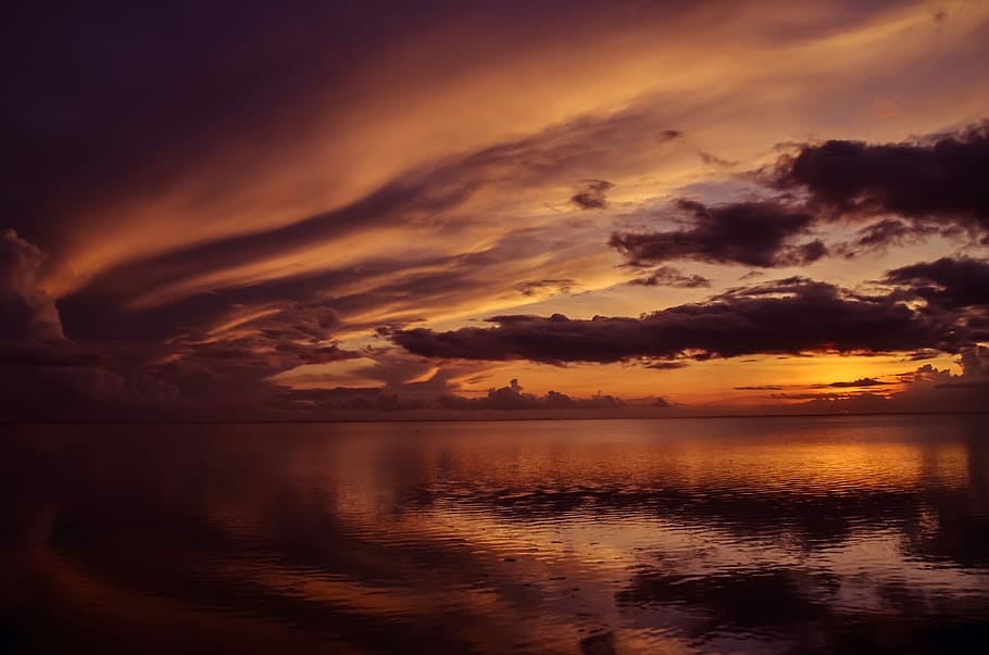body of water during dawn, calm sea under orange sky during sunset landscape photography HD wallpaper