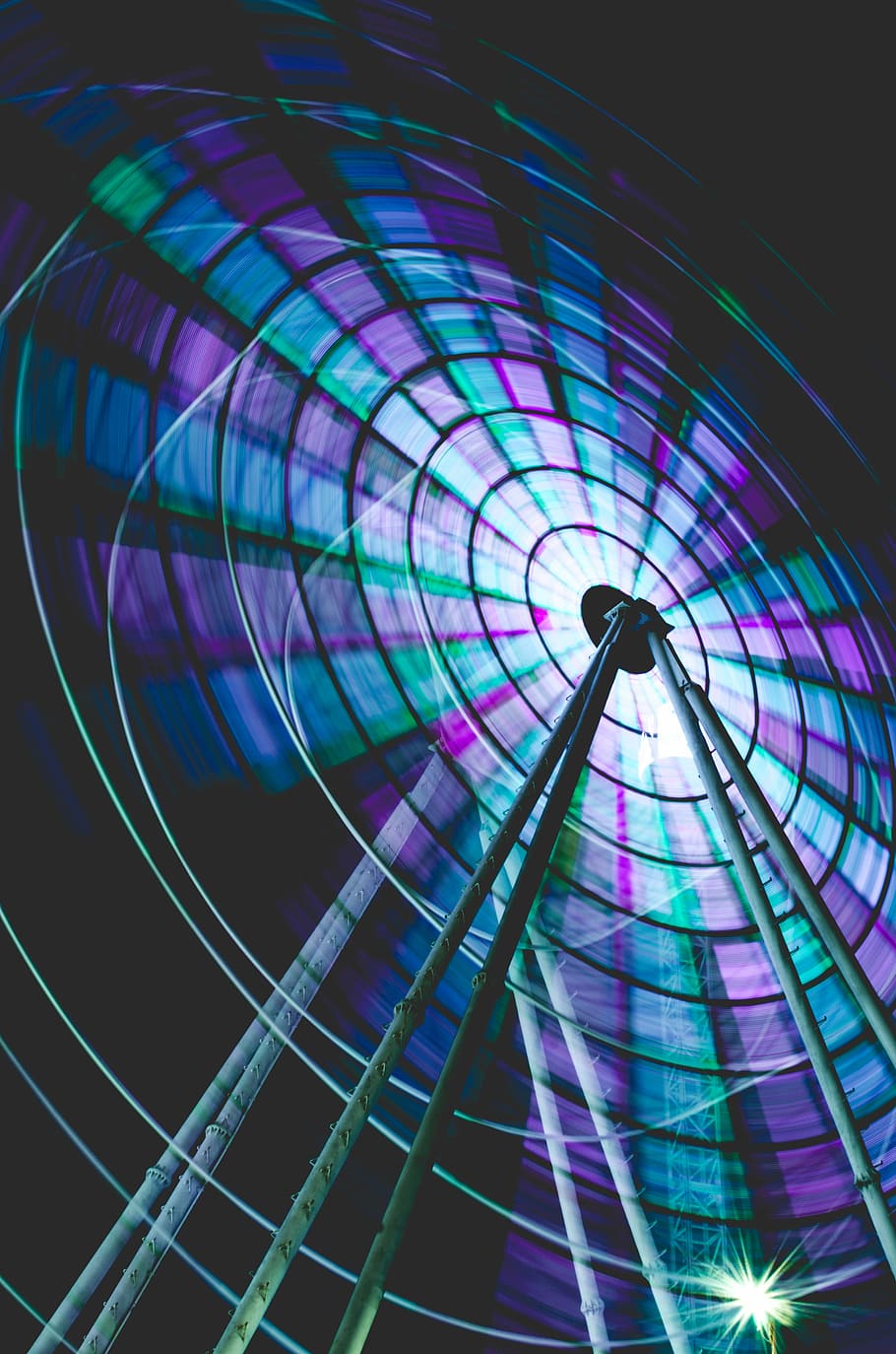 timelapse photo of ferris wheel, purple, green, and blue lighted ferris wheel