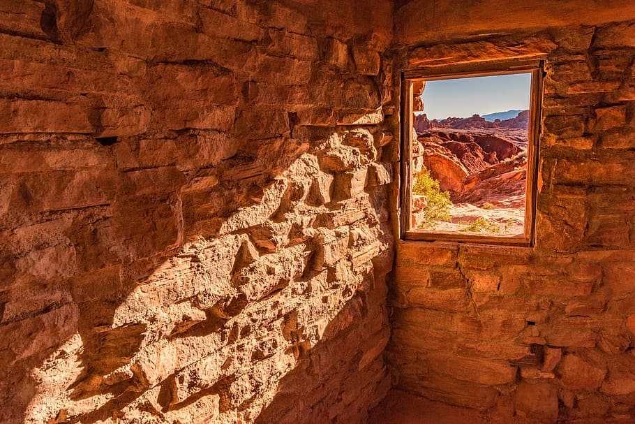 rock wall with window background of rock formation, sunlight shining through window HD wallpaper