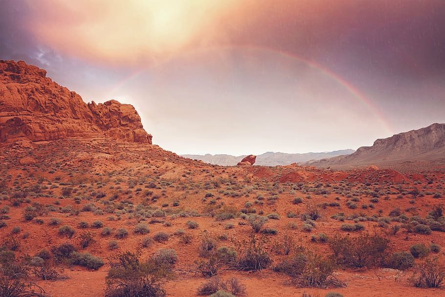 rainbow across valley during golden hour, sunset, mountains HD wallpaper