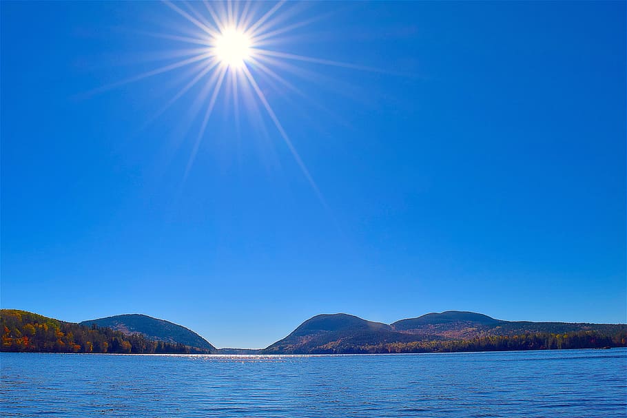 landscape photography of island, lake, trees, sun, foliage HD wallpaper