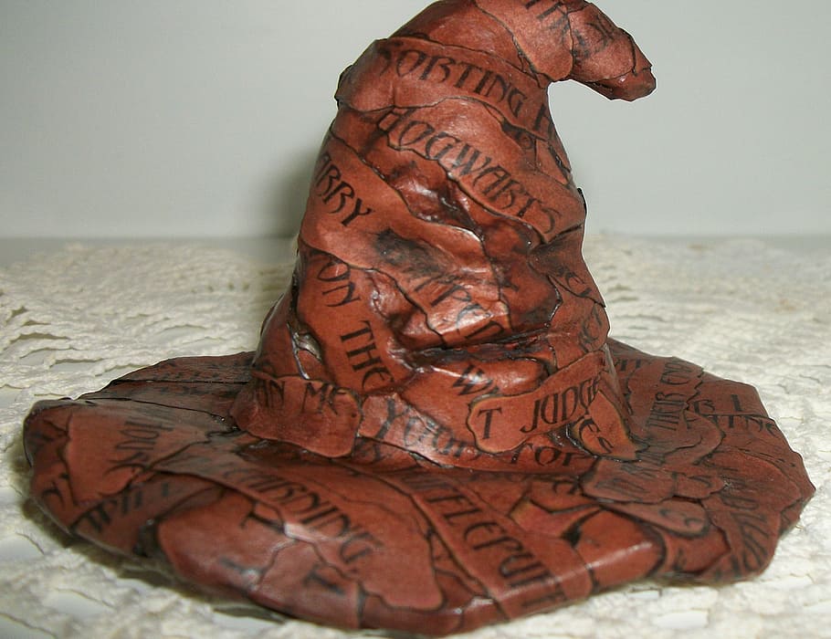 brown wizard hat on beige surface, sorting hat, christmas ornament HD wallpaper