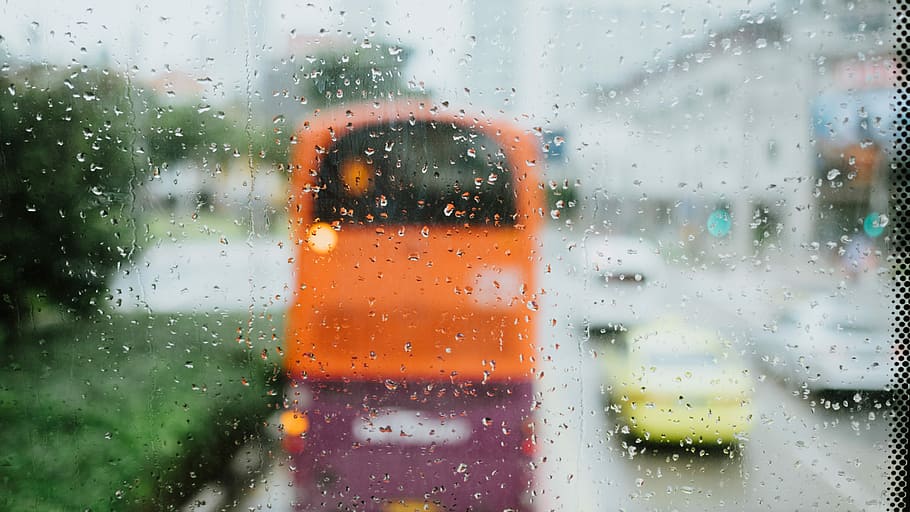 water droplets on glass, blurry photo of orange bus, window, rain HD wallpaper
