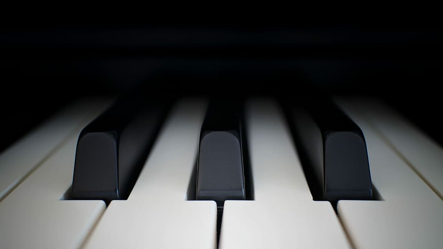 piano keys, closeup photo of black and white keyboard, bokeh