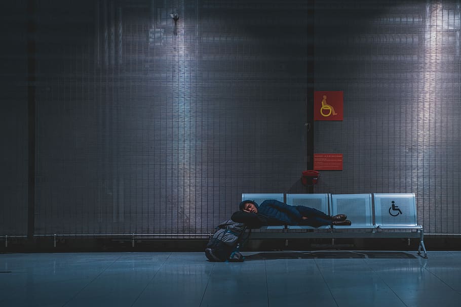 person sleeping on gray gang chair, person sleeping on gray steel gang chair HD wallpaper