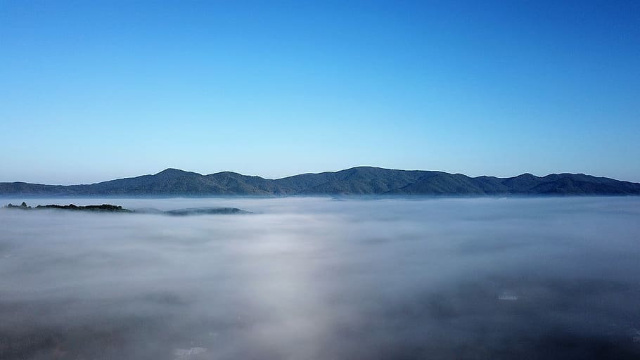 Fog over Ducktown TN., landscape photography of white cloud and mountain HD wallpaper
