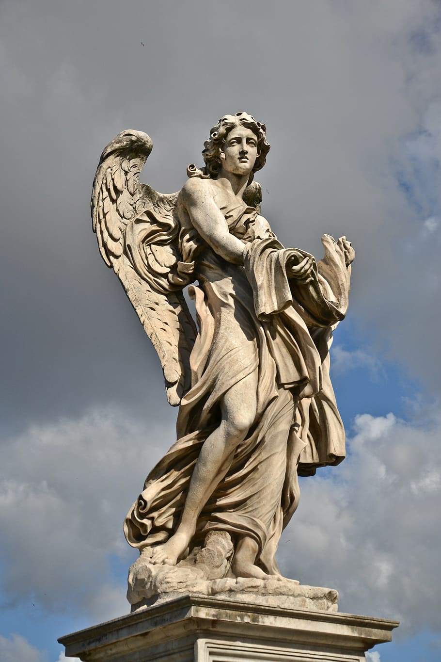 photo of man with wings statue, rome, sculpture, italy, monument