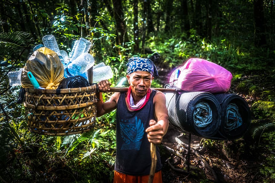 Strength - Mt Rinjani, Lombok, Indonesia. 2018, man carrying camping needs in the middle of woods HD wallpaper