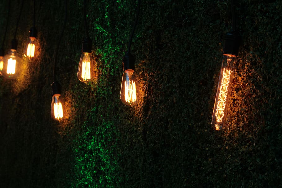 brown string lights, low light photography of wall-mount outdoor lanterns HD wallpaper