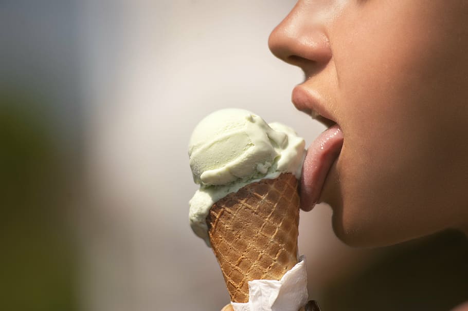 person licking ice cream, dessert, sweet, food, frozen, woman