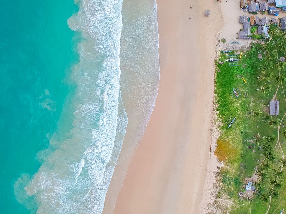 ocean waves on shore, top view of beach, aerial, sea, drone, land