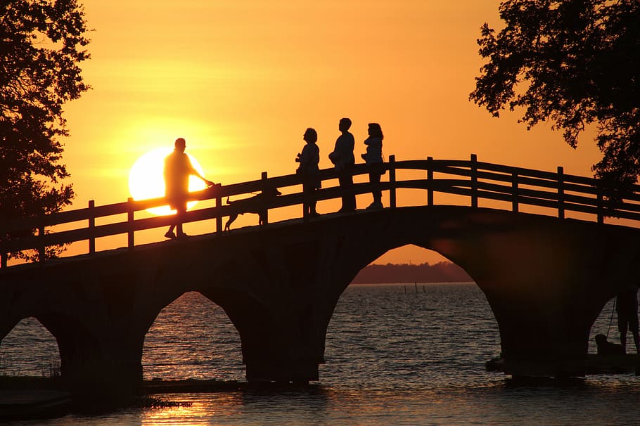 silhouette of persons on bridge during sunset, park, people HD wallpaper