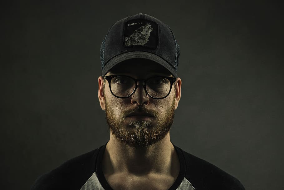 man wearing black curve brim cap and clear eyeglasses with black frames, close-up photography of man wearing black fitted cap and black framed clear lens sunglasses HD wallpaper
