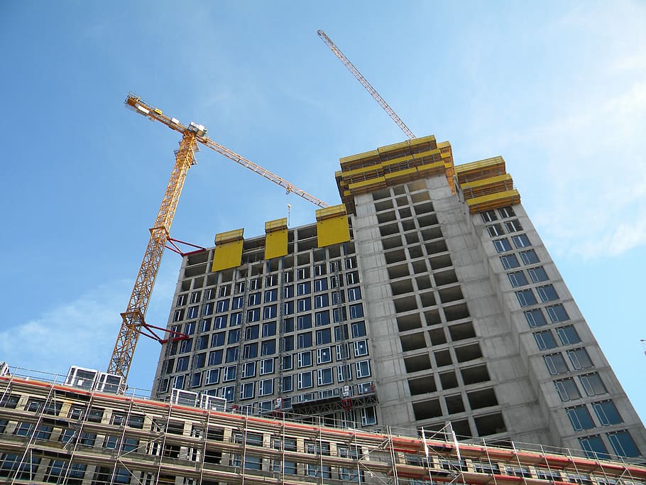 worm's-eye view photo of gray concrete building during daytime HD wallpaper